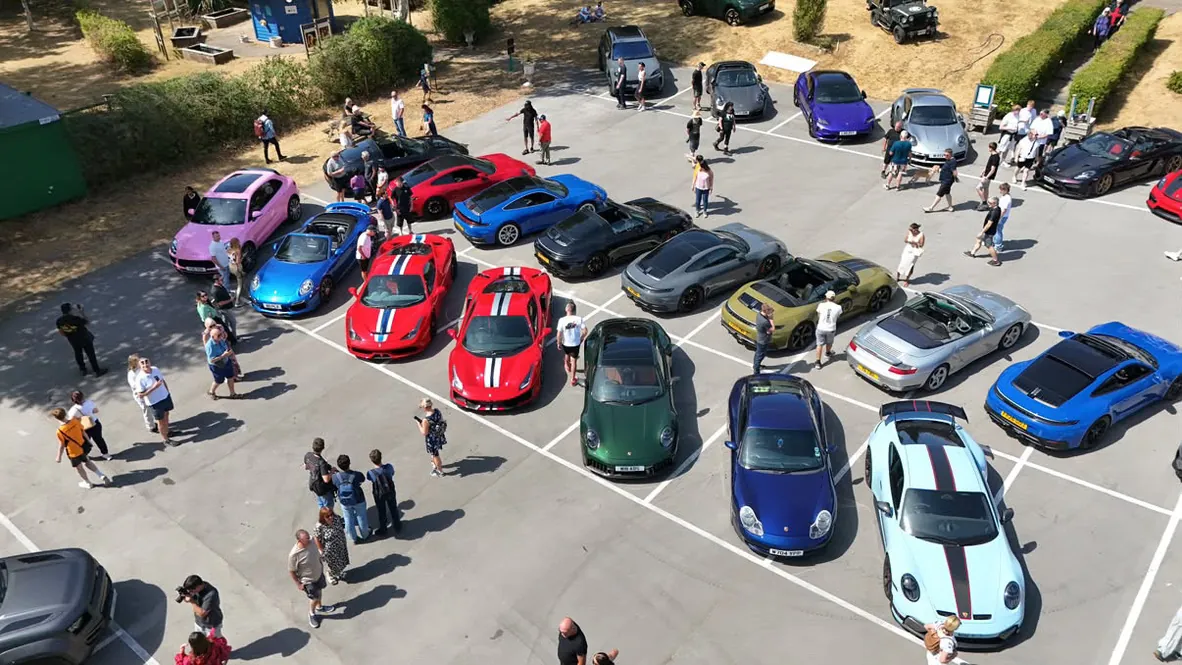 Cars filling the field at an Overdrive meet
