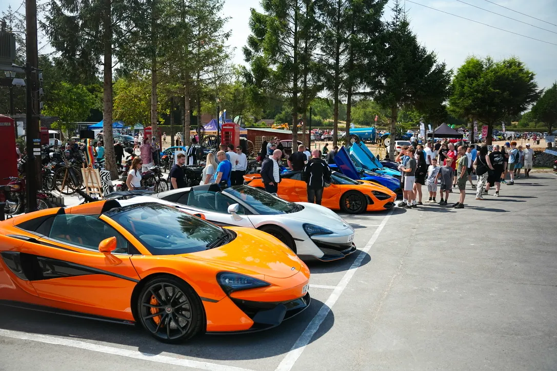 Orange sports car on display